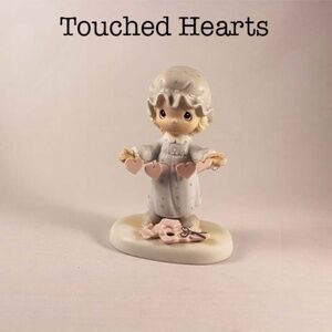 Precious Moments Figurine:  You Have Touched So Many Hearts